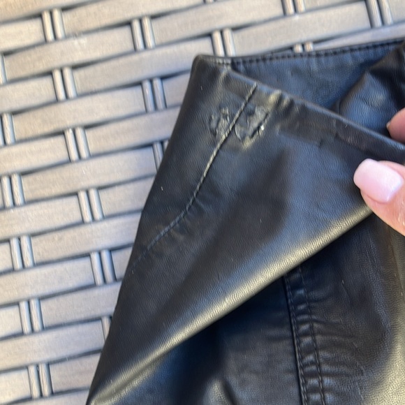 Free People faux leather mini skirt.  Fully lined.  Zips in the back.  Cute on! - Picture 5 of 9